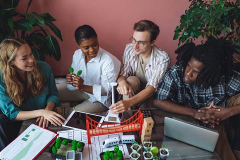 A group of students discussing a project